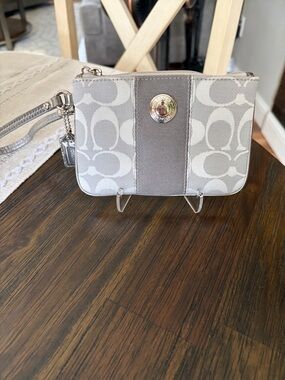 Coach Signature Canvas Wristlet in Light gray/cream LIKE NEW